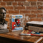 Robert Nozick bust, Spider-Man figure, philosophy books and comic book